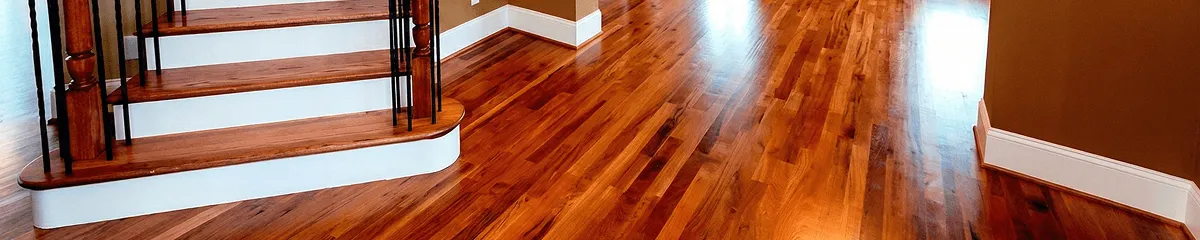 Base floor of a staircase with professionally restored wood flooring in Shreveport LA