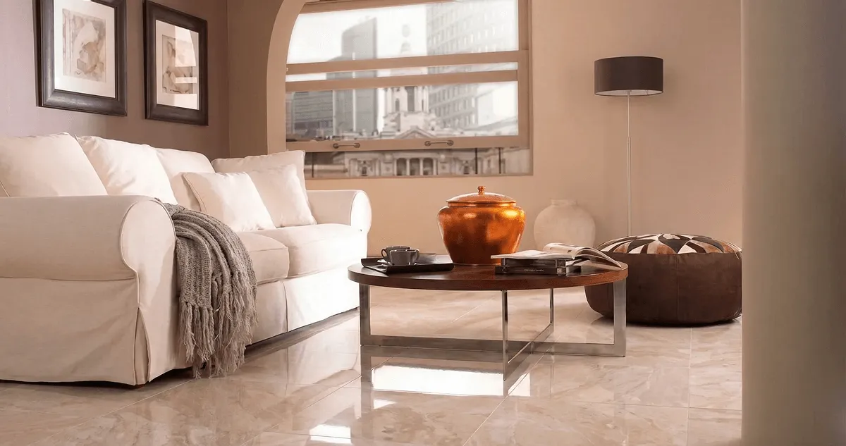 Modern living room with professionally installed marble flooring, a beige sofa, coffee table in Shreveport, LA