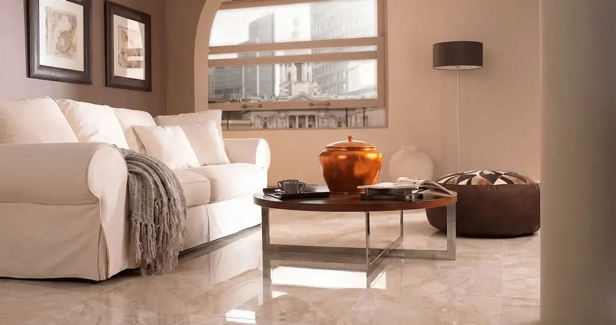 Modern living room with professionally installed marble flooring, a beige sofa, coffee table in Shreveport, LA